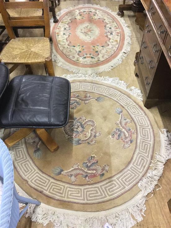 2 circular Chinese rugs